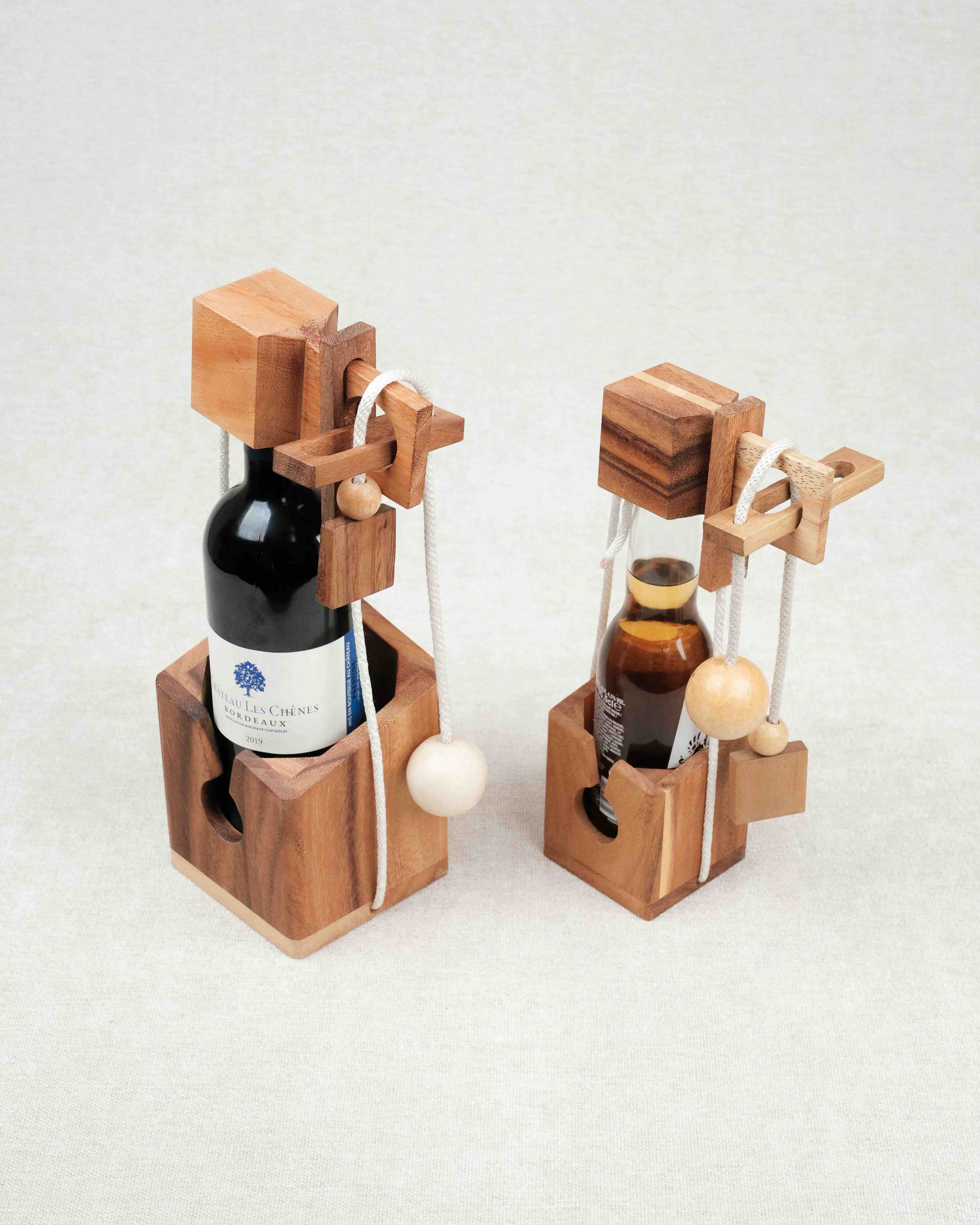 Petit et grand modèle de casse-tête bouteille en bois – Jeux Faugère