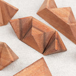 Casse-tête La Star en bois démonté en plusieurs pièces.