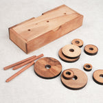 Disques et piquets du casse-tête en bois La Tour de Hanoï démontés – Jeux Faugère