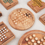 Vue comparative avec d’autres jeux de solitaire en bois autour