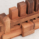 Casse-tête Bateau L en bois – détail des pièces imbriquées