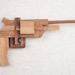 Casse-tête en bois Le Pistolet – vue de profil du puzzle 3D