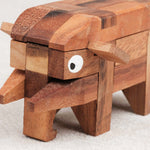 Casse-tête L’Éléphant en bois – détail de la tête avec défenses et trompe