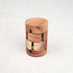 Casse-tête REVOLVE en bois cylindrique avec billes colorées – Jeux Faugère