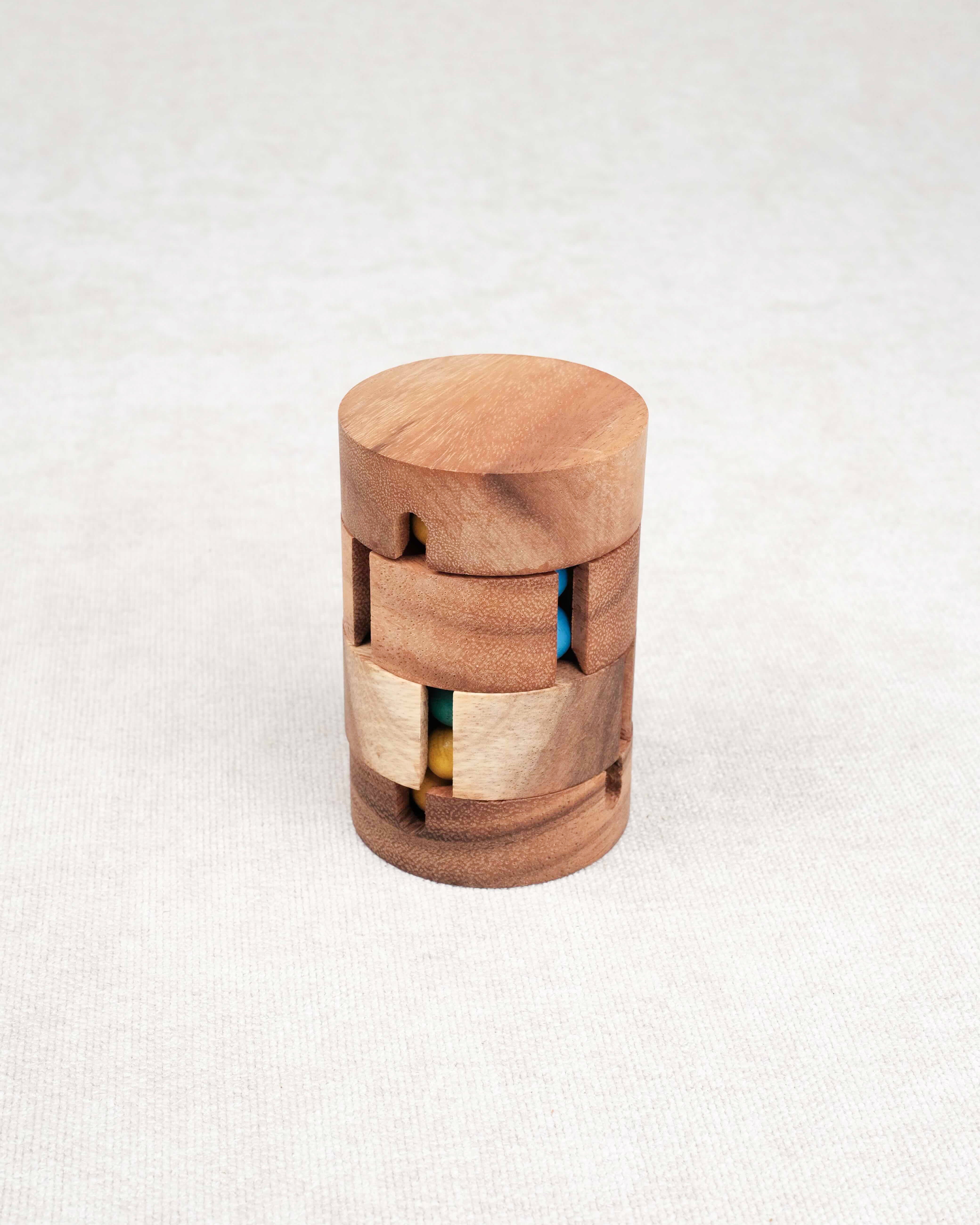 Casse-tête REVOLVE en bois cylindrique avec billes colorées – Jeux Faugère