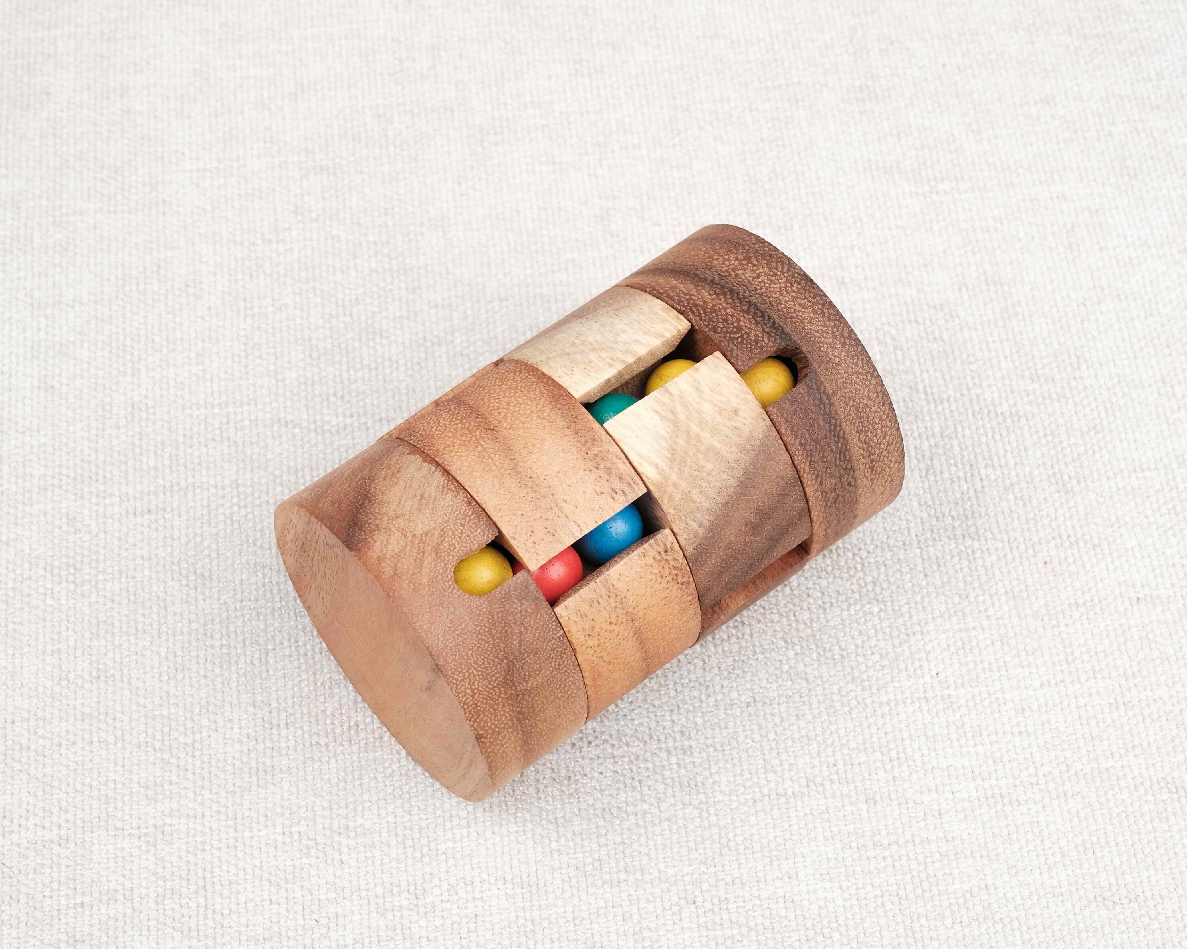 Casse-tête Revolve cylindrique en bois – logique et couleurs