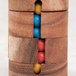 Jeu de logique REVOLVE en bois, type Rubik’s Cube cylindrique – Jeux Faugère