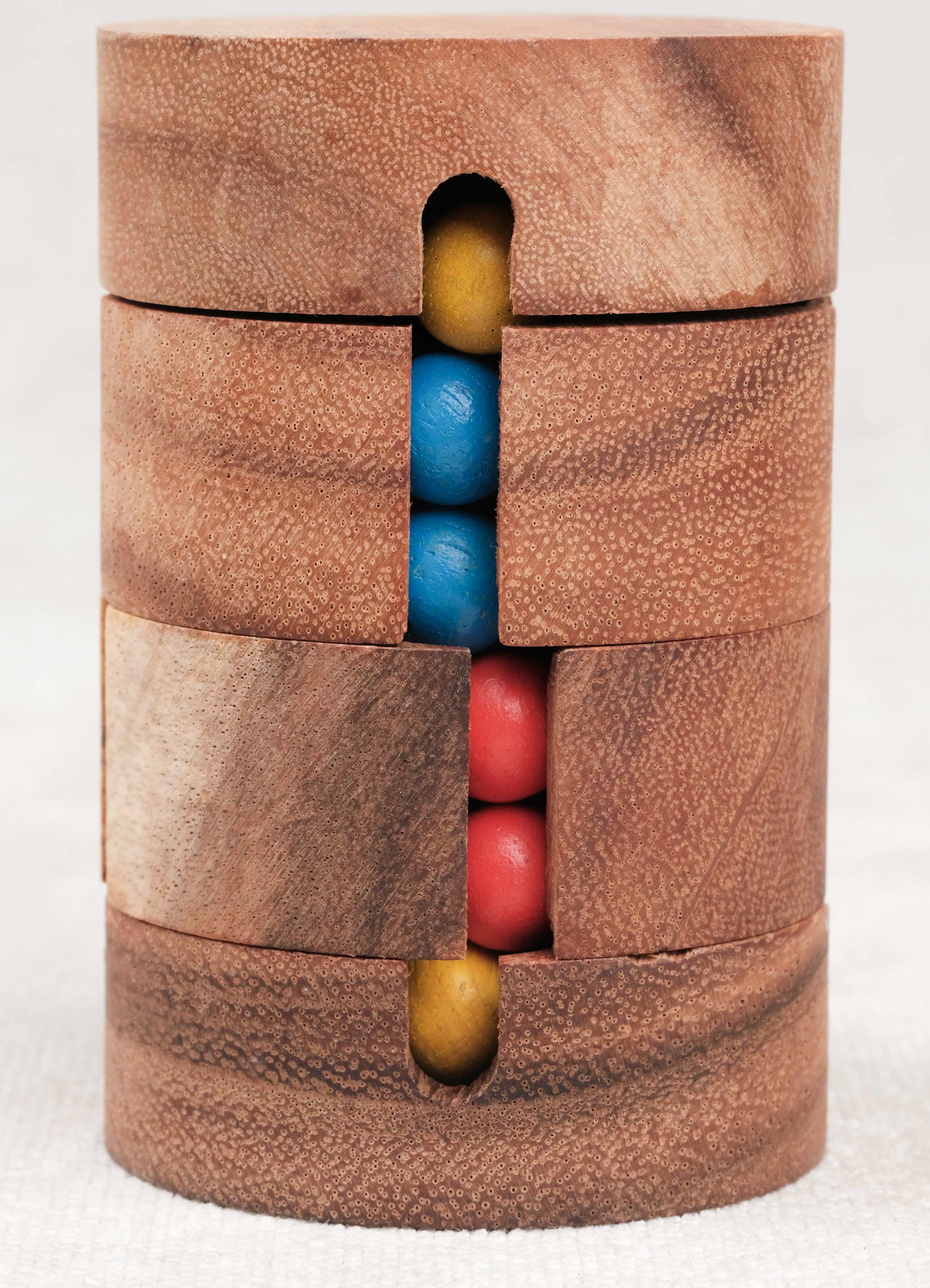 Jeu de logique REVOLVE en bois, type Rubik’s Cube cylindrique – Jeux Faugère