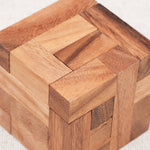 Casse-tête Convolution en bois – détail du mécanisme avec pièces imbriquées