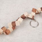 Mini cube serpent en bois déplié en longue chaîne avec anneau porte-clés.