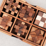 Vue du coffret ouvert avec les puzzles bien rangés