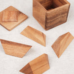 Puzzle Pyramides en Boîte – pièces géométriques en bois sorties de la boîte