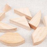 Pièces en bois du tangram œuf disposées à plat – Double Tangram Œuf Jeux Faugère