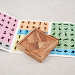 Coffret en bois ouvert avec tangram en 7 pièces et livret coloré – Tangram et son Livret Jeux Faugère