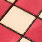 Plateau d’échecs bois rouge et naturel avec cases gravées