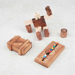 Vue d’ensemble du Pack Malin « Casse-têtes Premiers Défis » avec ses trois casse-têtes et le mini offert