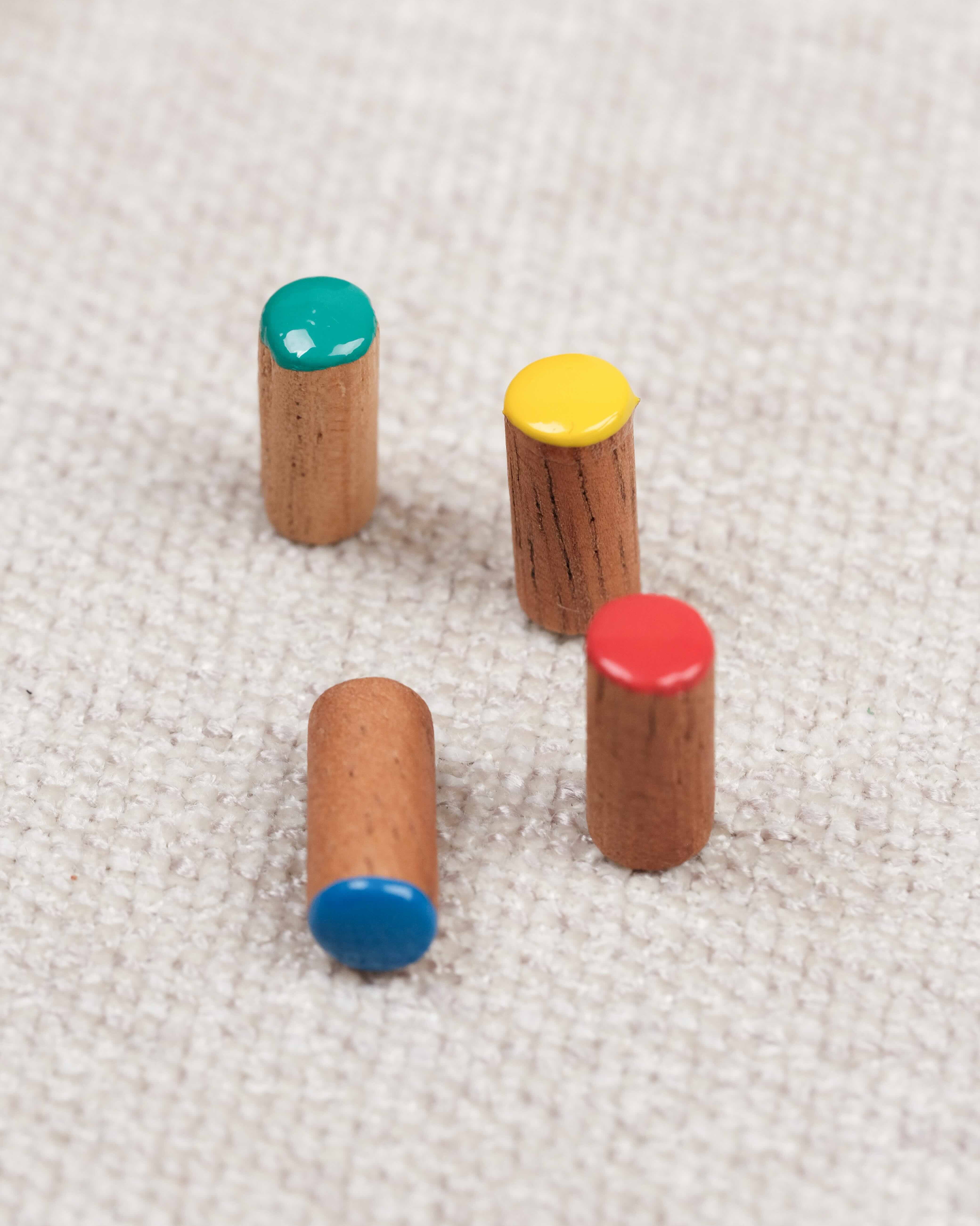 4 pions colorés de Serpents et Échelles