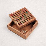 Coffret refermable avec rangement intégré des pions