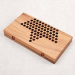 Coffret en bois fermé contenant les pions de Dames Chinoises L