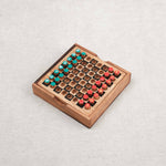 Jeu d’échecs de voyage en bois – petit échiquier compact