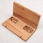 Coffret du jeu Barricade ouvert avec rangement intégré