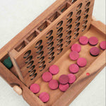 Coffret ouvert du Puissance 4 en bois avec rangement intégré