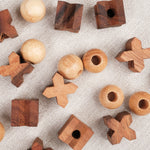 Pièces du Morpion 3D M en bois : croix et boules séparées