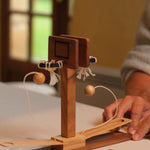 Joueur lançant la balle au Double Basket Jeux Faugère.