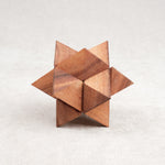 Casse-tête en bois La Star — puzzle à démonter et remonter, format compact.
