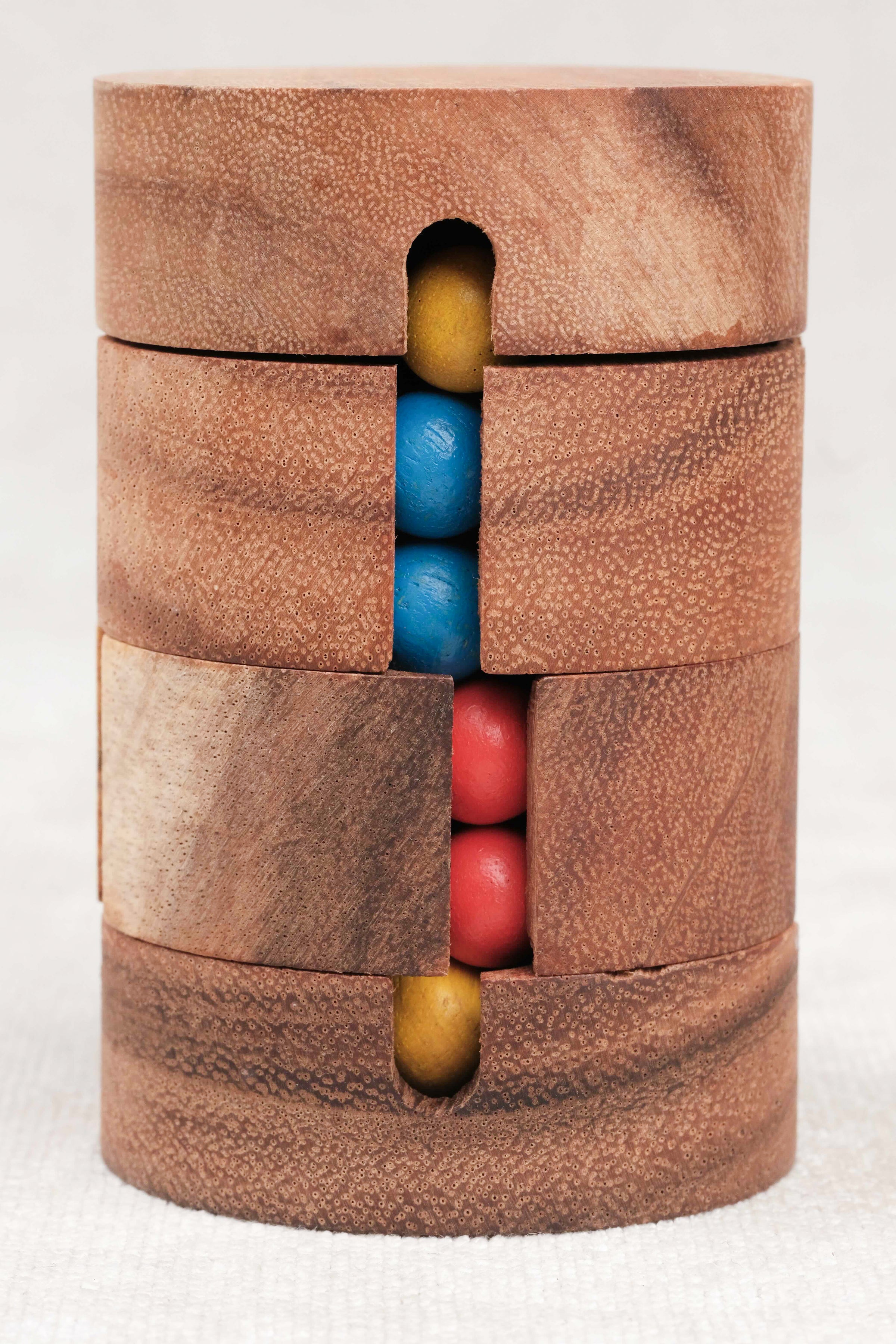 Jeu de logique REVOLVE en bois, type Rubik’s Cube cylindrique – Jeux Faugère