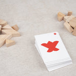 Pièces du tangram cœur en bois disposées à plat – Double Tangram Cœur Jeux Faugère