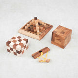 Les trois casse-têtes du pack alignés sur fond clair : Double Cube, convolution, Kheops avec le mini casse-tête offert Roméo et Juliette