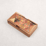 Coffret Triomino en bois avec pièces triangulaires sérigraphiées et colorées