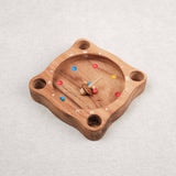 Jeu de La Giroulette en bois avec toupie et billes colorées